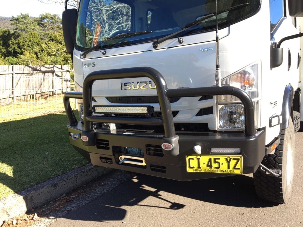 Preparing for the worst. We decided to fix winches front and back on our Isuzu NPS truck.