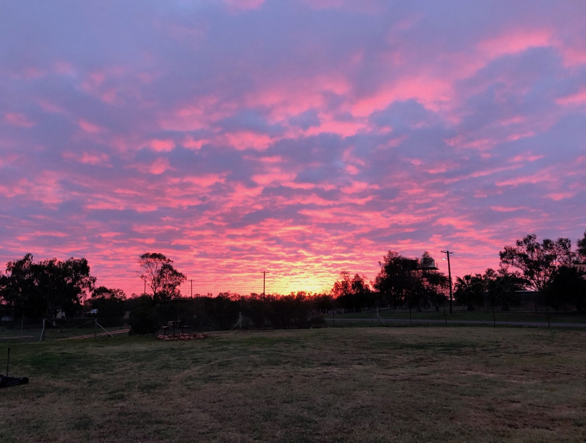 An incredible pink sunset at Wanaaring, NSW. The Cut Line, NSW.