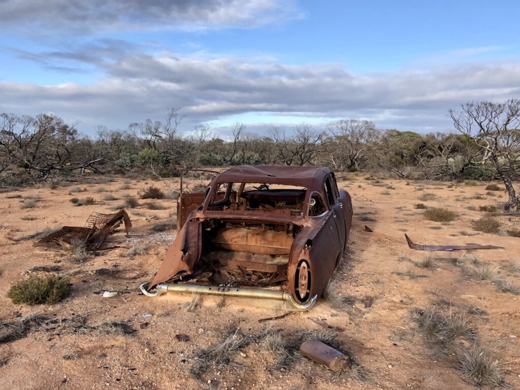 A 1950's American car that has obviously rolled. Old Eyrte Highway, Nullarbor Plain SA.