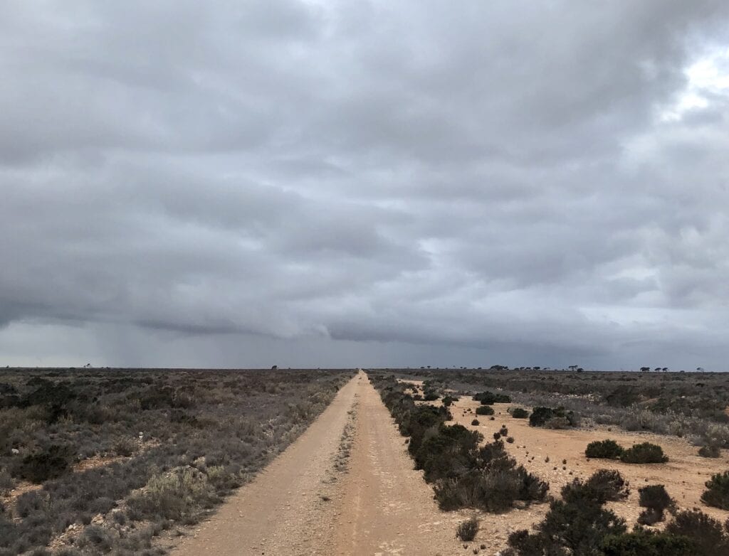 Light showers near Nullarbor Roadhouse instantly turned the Old Eyre Highway into a slippery muddy slop.