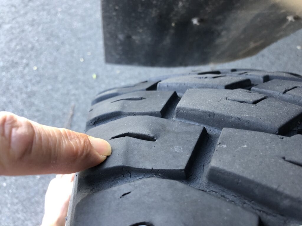 The strange tyre wear on the driver's front tyre of our Isuzu 4x4 truck.