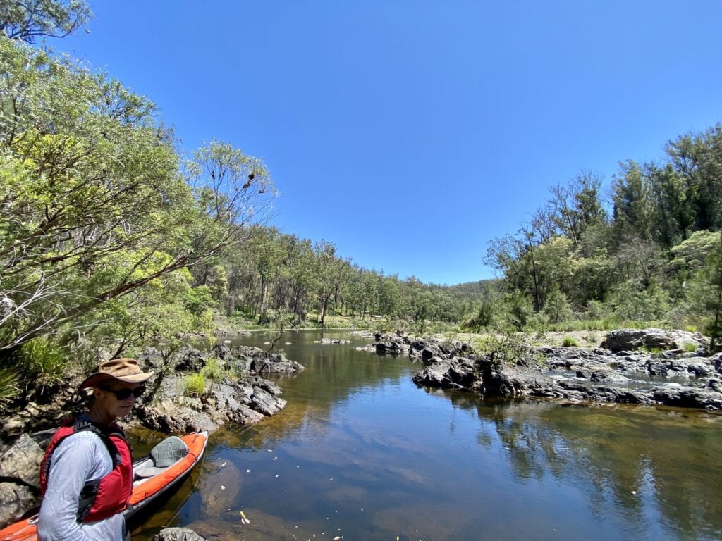 Kayaking on the Nymbioda River at Platypus Flat campround NSW.