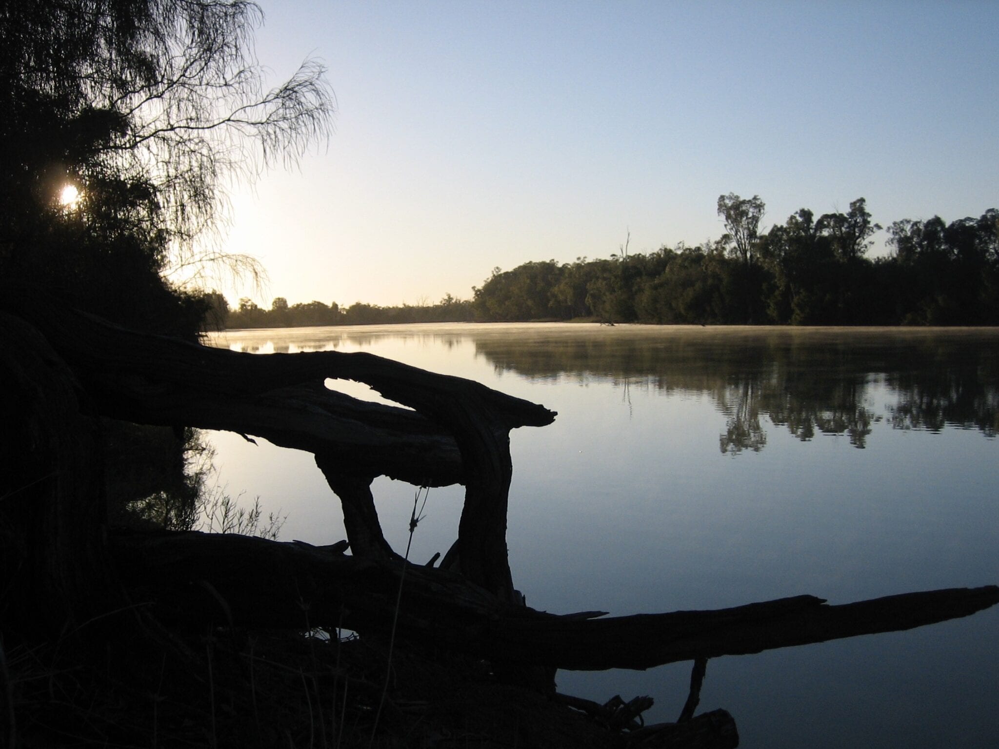 Sunrise on an Australian Outback river.