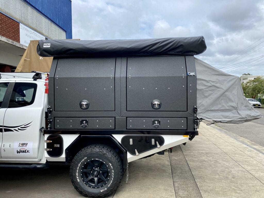 The Wedgetail Hawk ute canopy camper viewed from the passenger side.