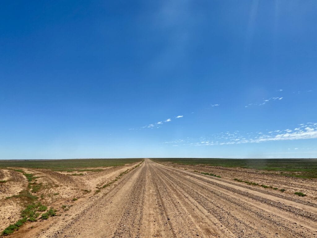 Once up on the tableland, Arrabury Road pushes through vast open plains.