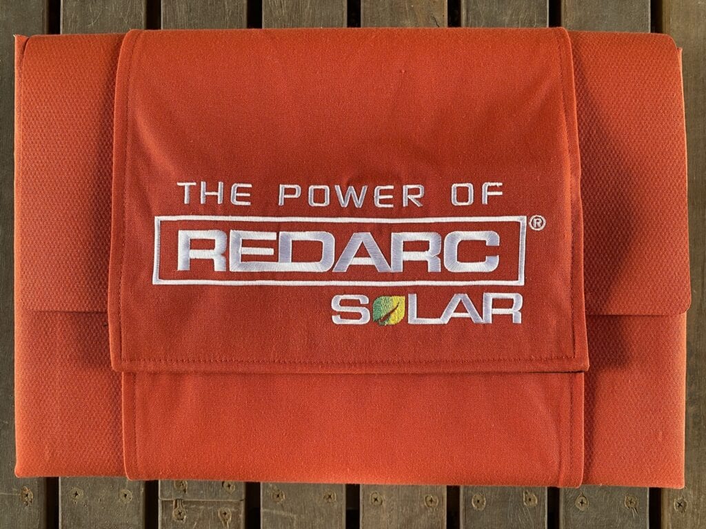 REDARC's solar blankets fold into a neat bundle, with a wraparound flap to secure the blanket.