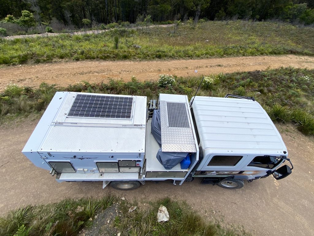 Aerial view of our Isuzu NPS crew cab with Wedgetail camper.