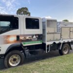 Passenger side. The finished result after modifying the storage boxes on our Isuzu NPS crew cab.