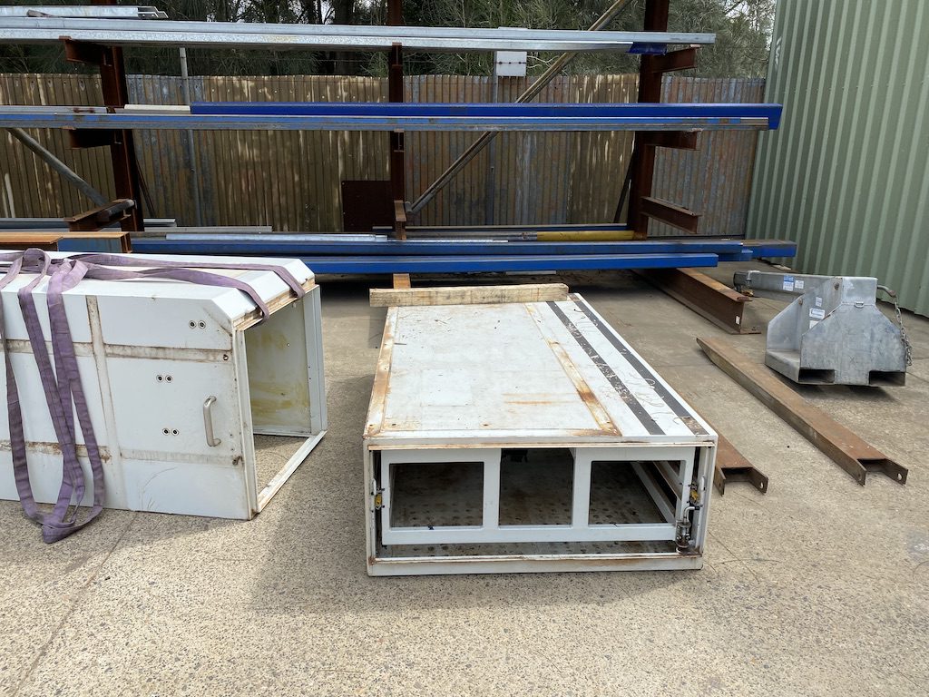 Old storage boxes after being removed from our Isuzu NPS crew cab.