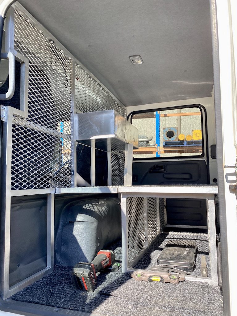 Step 3 of our storage shelf build in our Isuzu NPS crew cab.