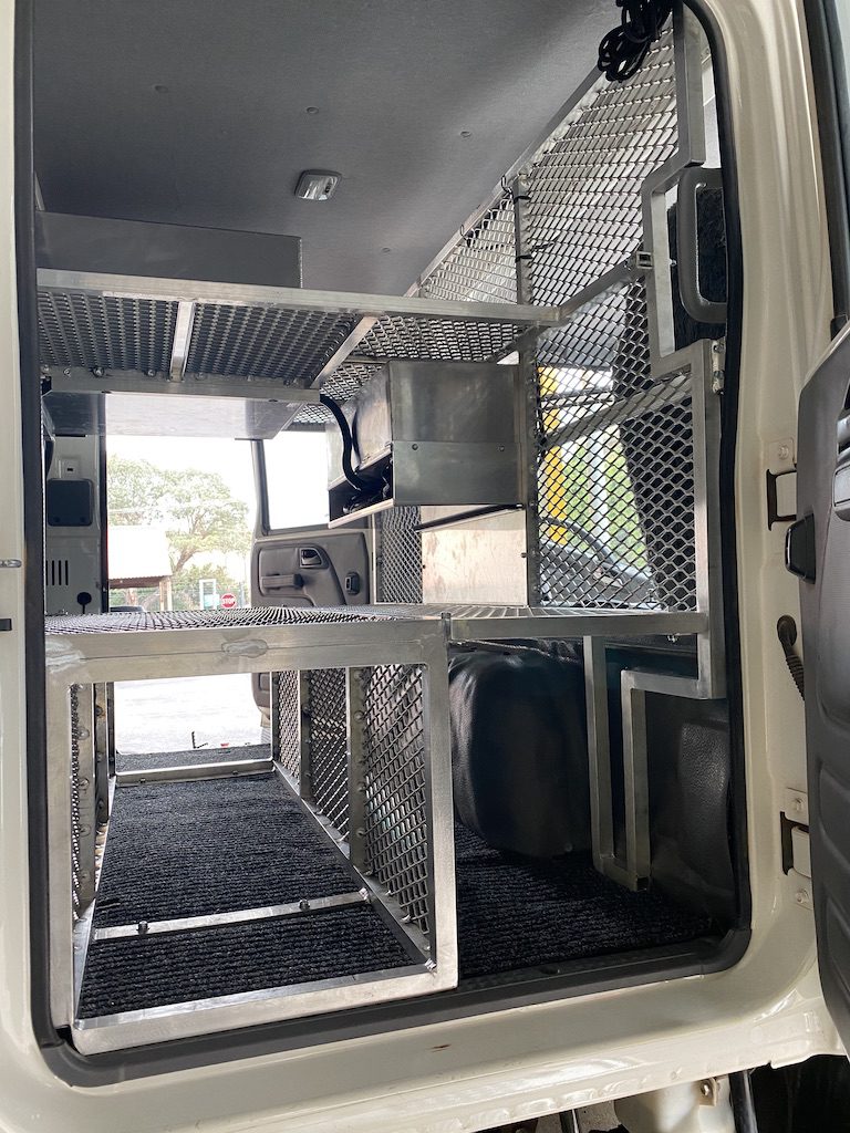 Step 5 of our storage shelf build in our Isuzu NPS crew cab.