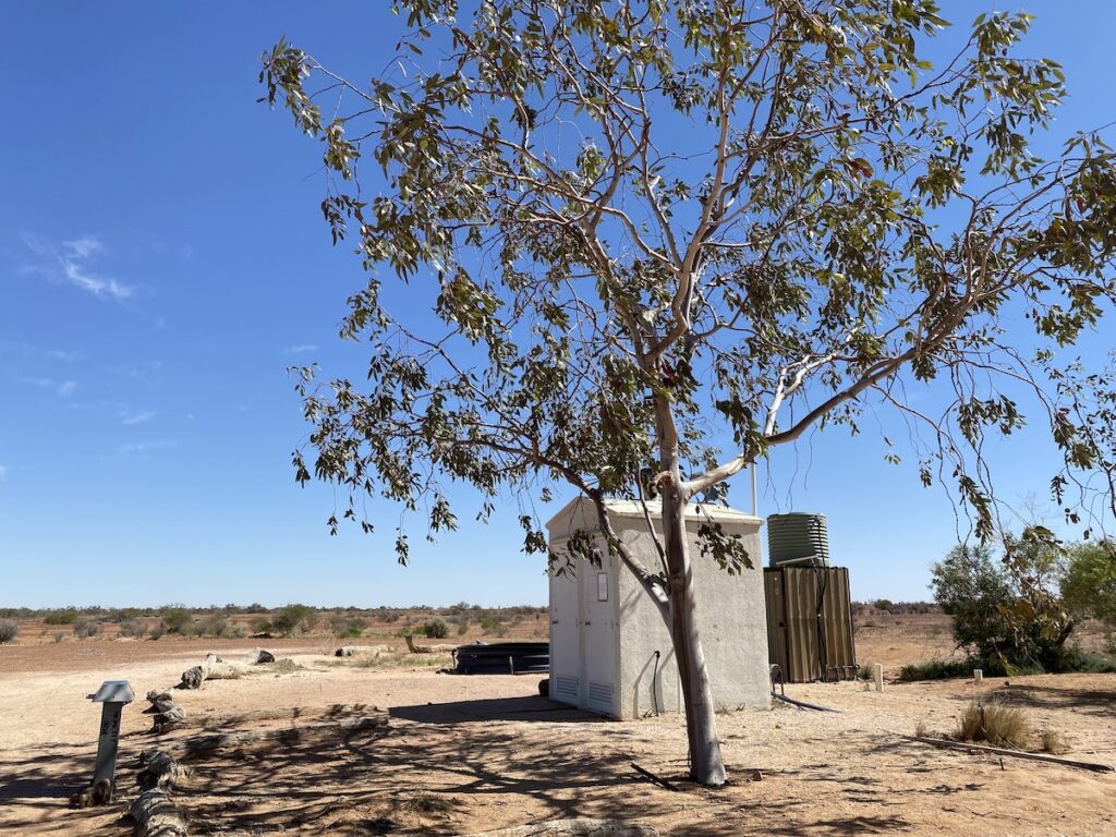 Clayton Wetlands Campground on the Birdsville Track, showing the toilet, shower and outdoor spa.