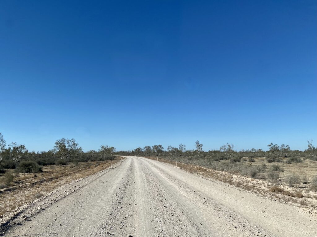 Driving across the Cooper Creek Floodway on the Birdsville Track, SA.