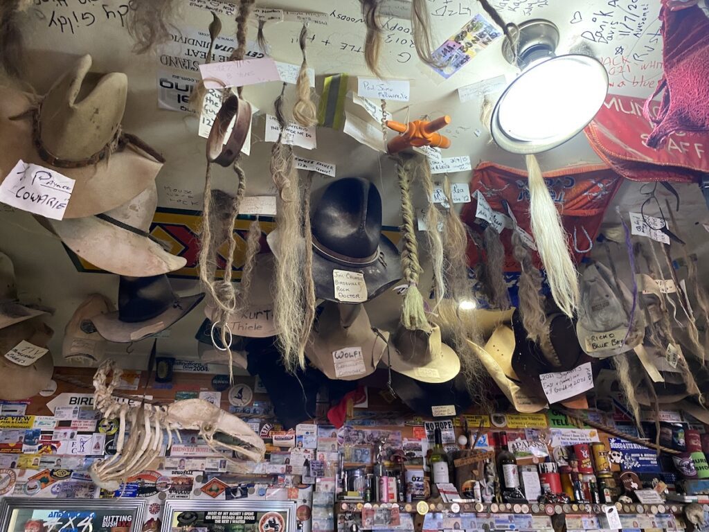 All sorts of memoribilia hanging from the ceiling and on the walls at Mungerannie Hotel on the Birdsville Track, South Australia.