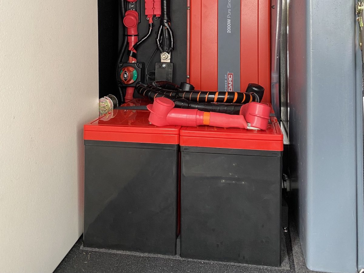 Two REDARC lithium batteries wired in parallel in a Wedgetail Hawk slide-on camper.