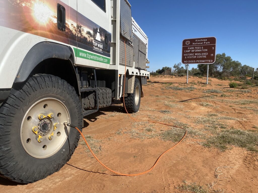 Using an ARB twin air compressor to inflate truck tyres.