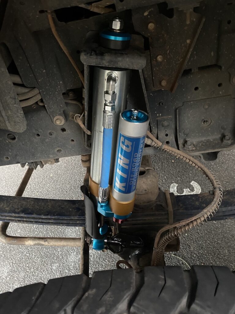 King Shocks with remote reservoirs fitted to the front of our Isuzu 4WD truck.