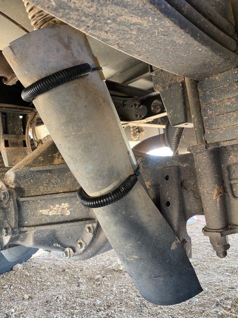 Cheap yet effective stone guards for the rear King Shocks on our Isuzu 4WD truck.