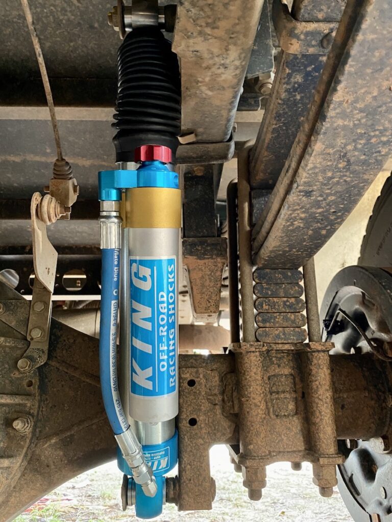 King Shocks with remote reservoirs fitted to the rear of our Isuzu 4WD truck.