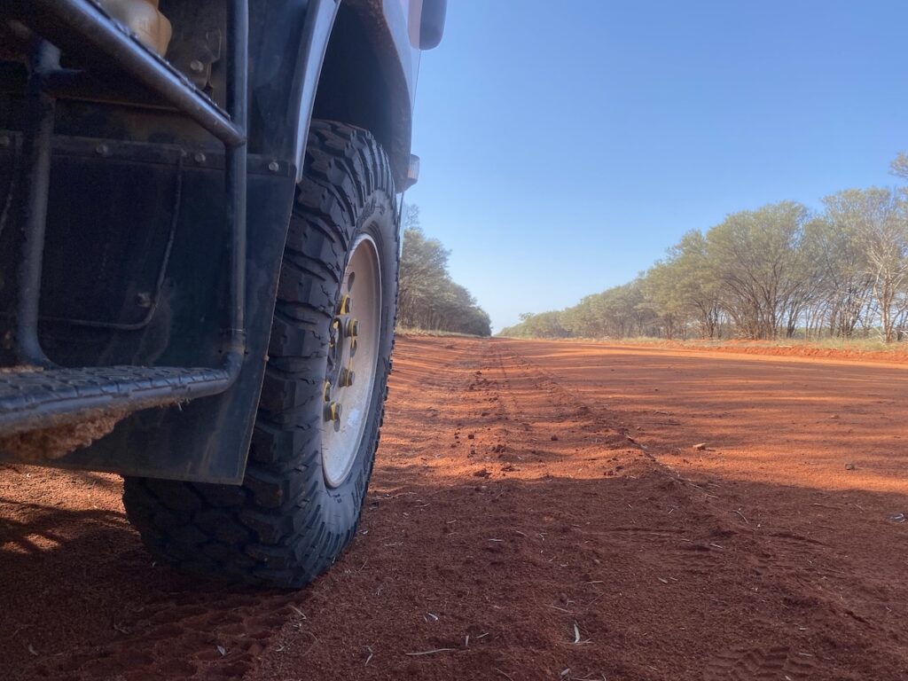 Founders 19.5 inch tyres on a sandy back road.