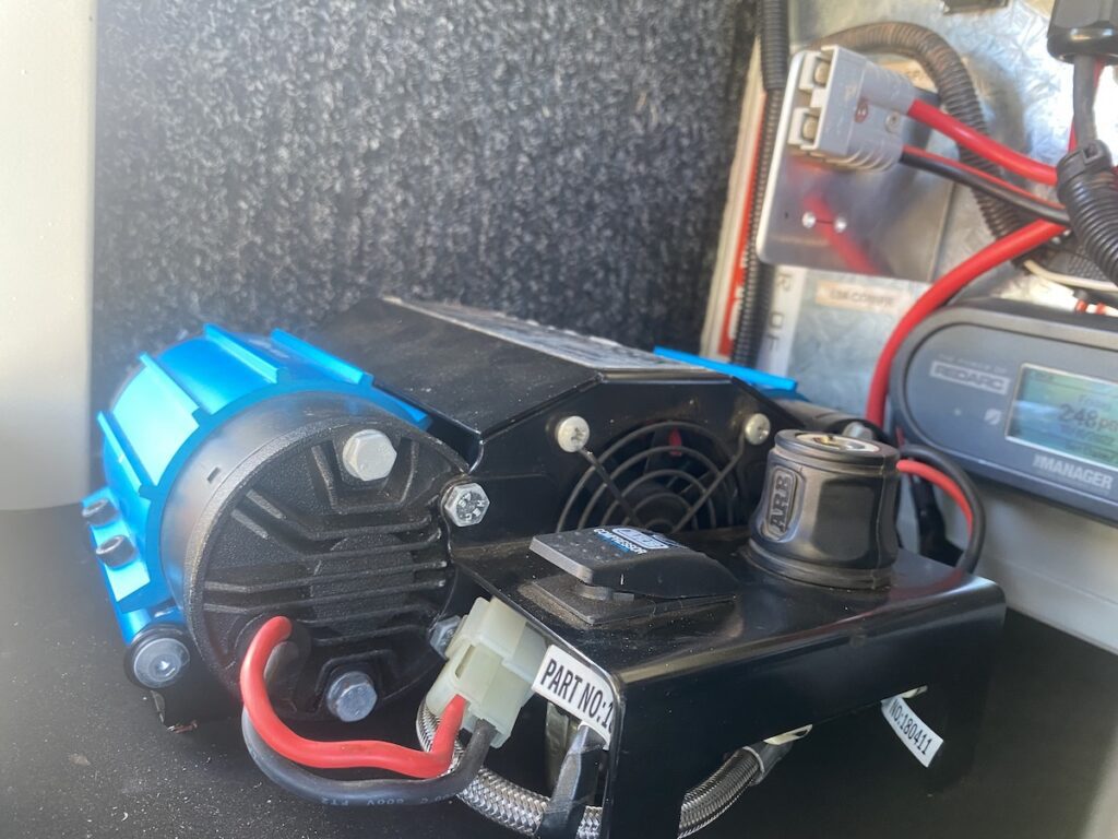 ARB air compressor converted from a portable to an on-board air compressor.