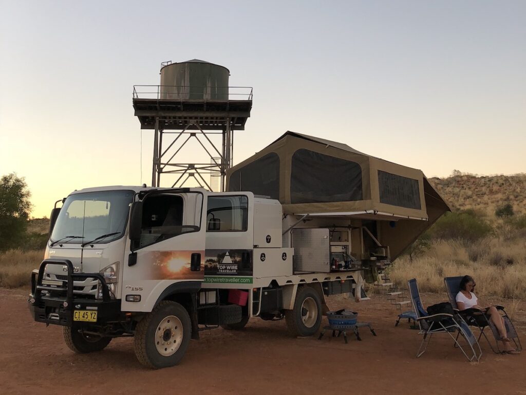 Wedgetail Camper set up near Punmu in northern Westren Australia. Water tank in background.