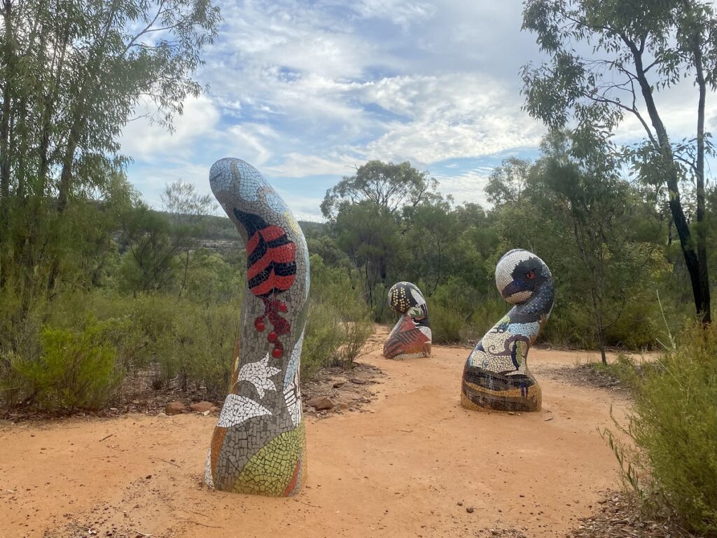 Winangaya Gunidjarr (Respect Mother) sculpture. 3 of 5 mosaics depicting growth and life. Sculptures In The Scrub, Pilliga Forest NSW.