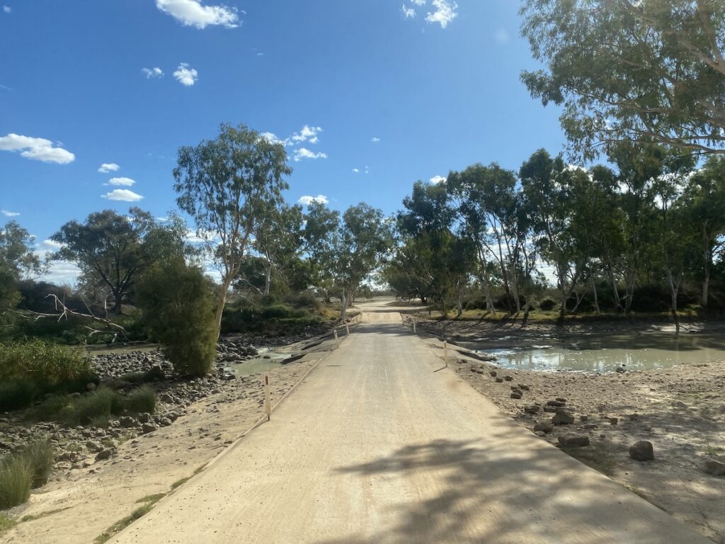 Crossing Cooper Creek at Innamincka Causeway.