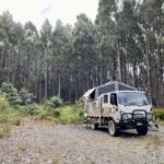 Our truck camper set up in a Tasmanian stste forest.